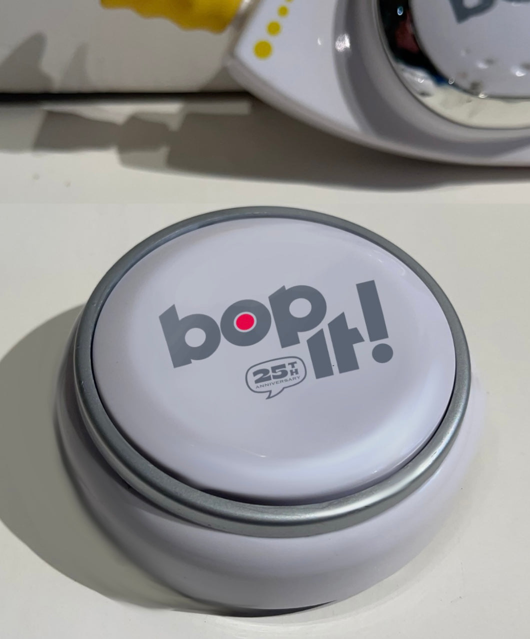 The Bop It Button (White)- Inventor’s 25th Anniversary Bonus Edition